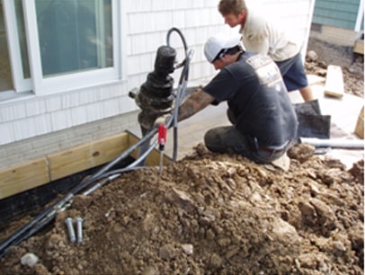 foundation repair using helical piers